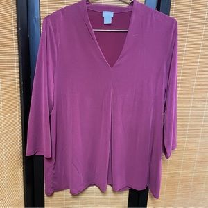 V-neck pleated shirt